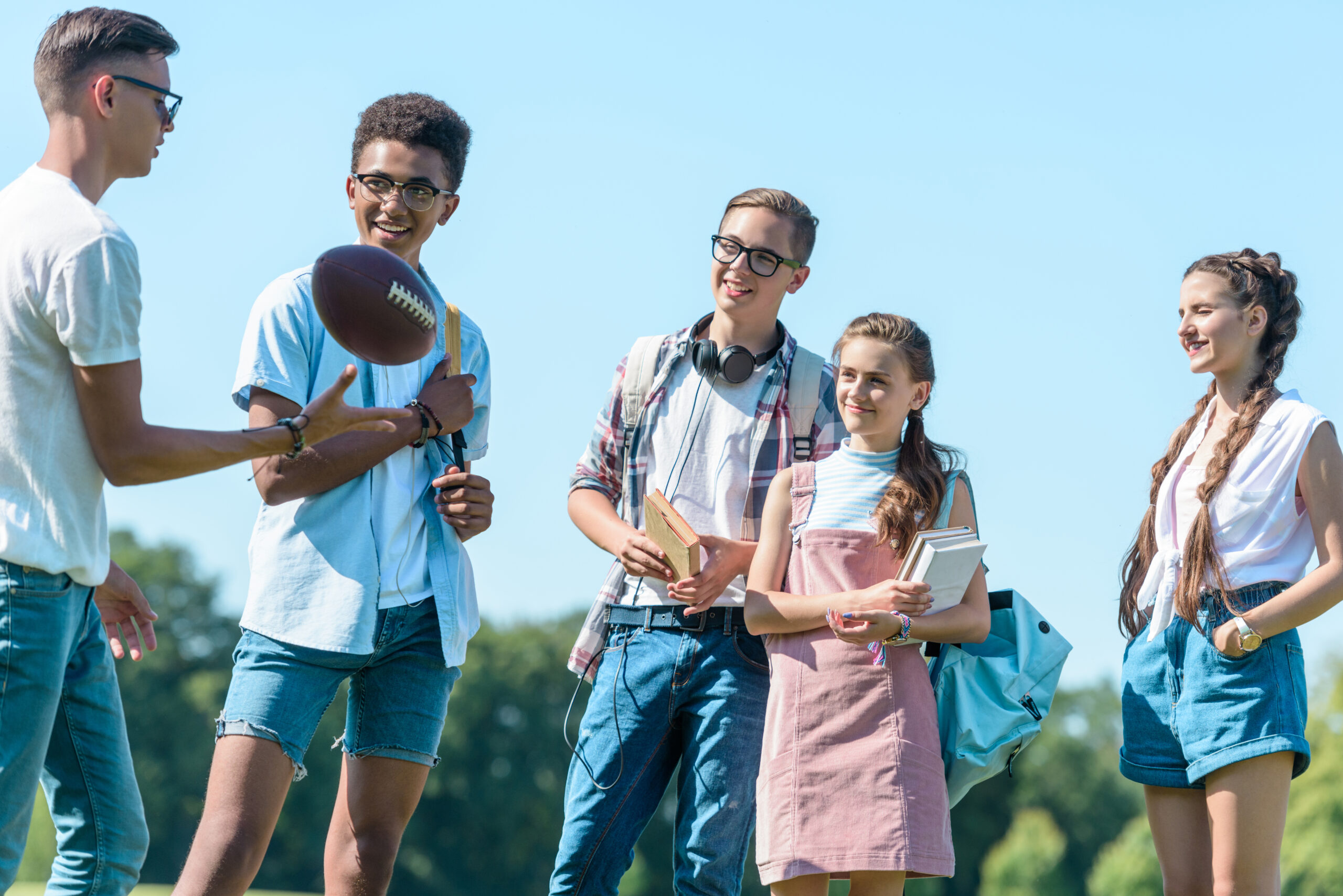 A student and an adviser going through a summer plan